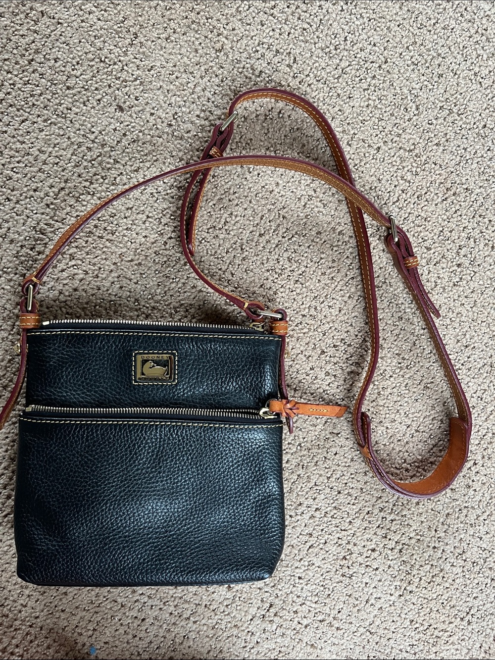 Dooney & Bourke Black Leather Crossbody with Brown Trim and Gold Hardware